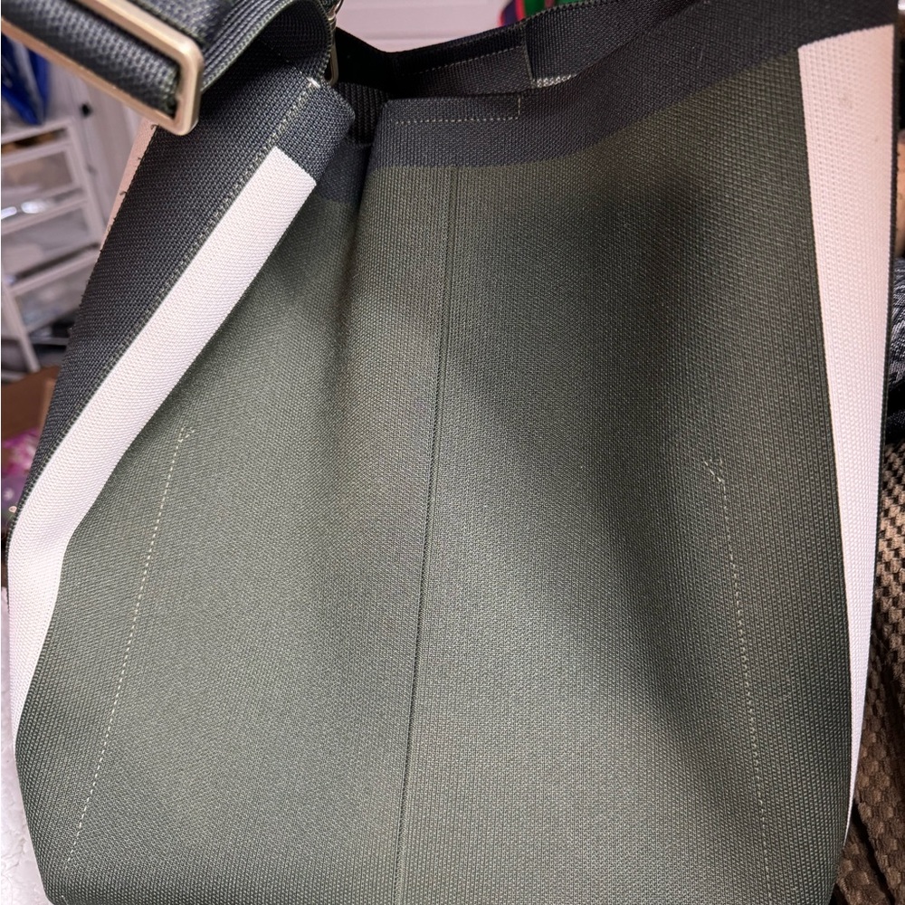 Rothy’s green and white bucket bag